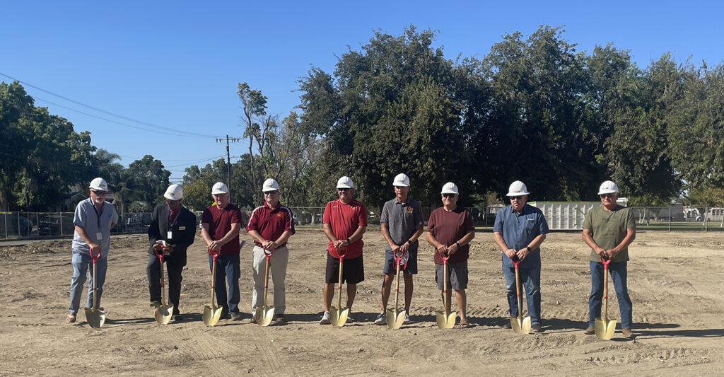 Officials and coaches prepare to ceremonially break ground including (l-r) Merced County Superintendent Dr. Steve Tietjen, LBUSD Superintendent Mark Marshall, “Legendary” Coach Don Toscano, LBHS Principal Jason Waltman, LB Tigers Football Head Coach Dustin Caropreso, LBHS Athletic Director and teacher Joe Barcellos, Coach Gary Caropreso, LBUSD Board President Anthony Parreira and Trustee Gary Munoz. Photo by Michael Cosenza