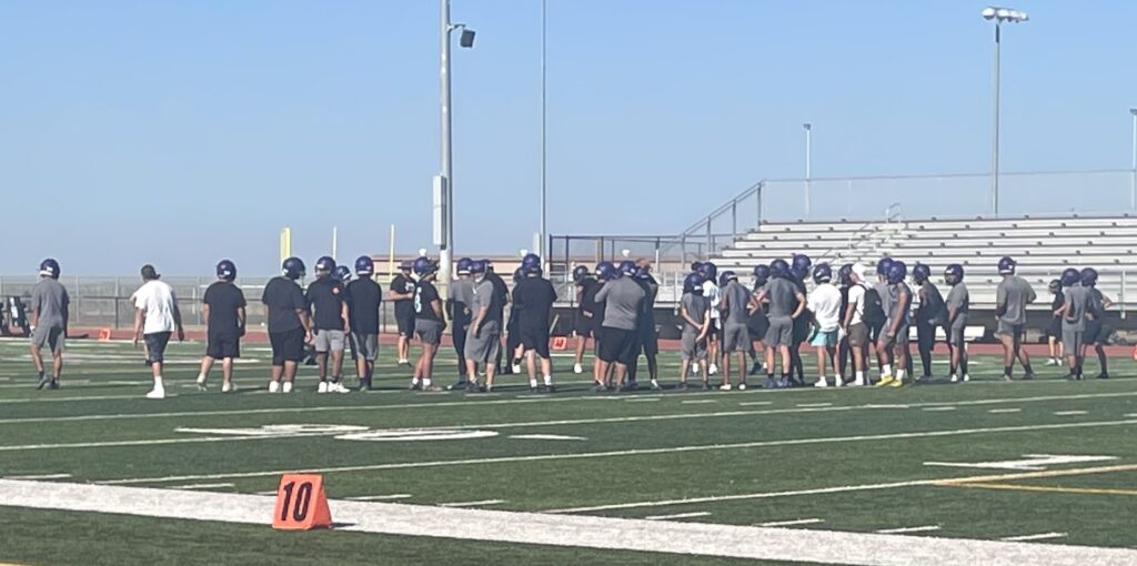 The Pacheco High Varsity Panthers football team practices Thursday afternoon, Aug. 25 ahead of their first game of the season. Photo by Michael Cosenza